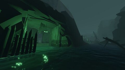 The flooded cave passage by the docks