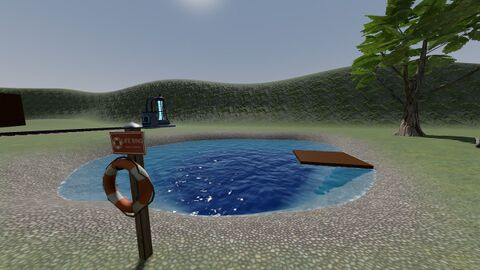 The pool with its raft platform in the grounds